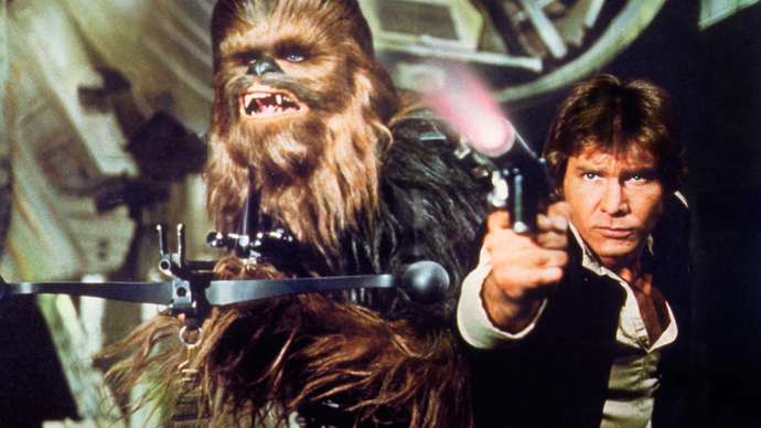 1620114741-Chewbacca-(Peter-Mayhew)-dan-Han-Solo-(Harrison-Ford).jpg